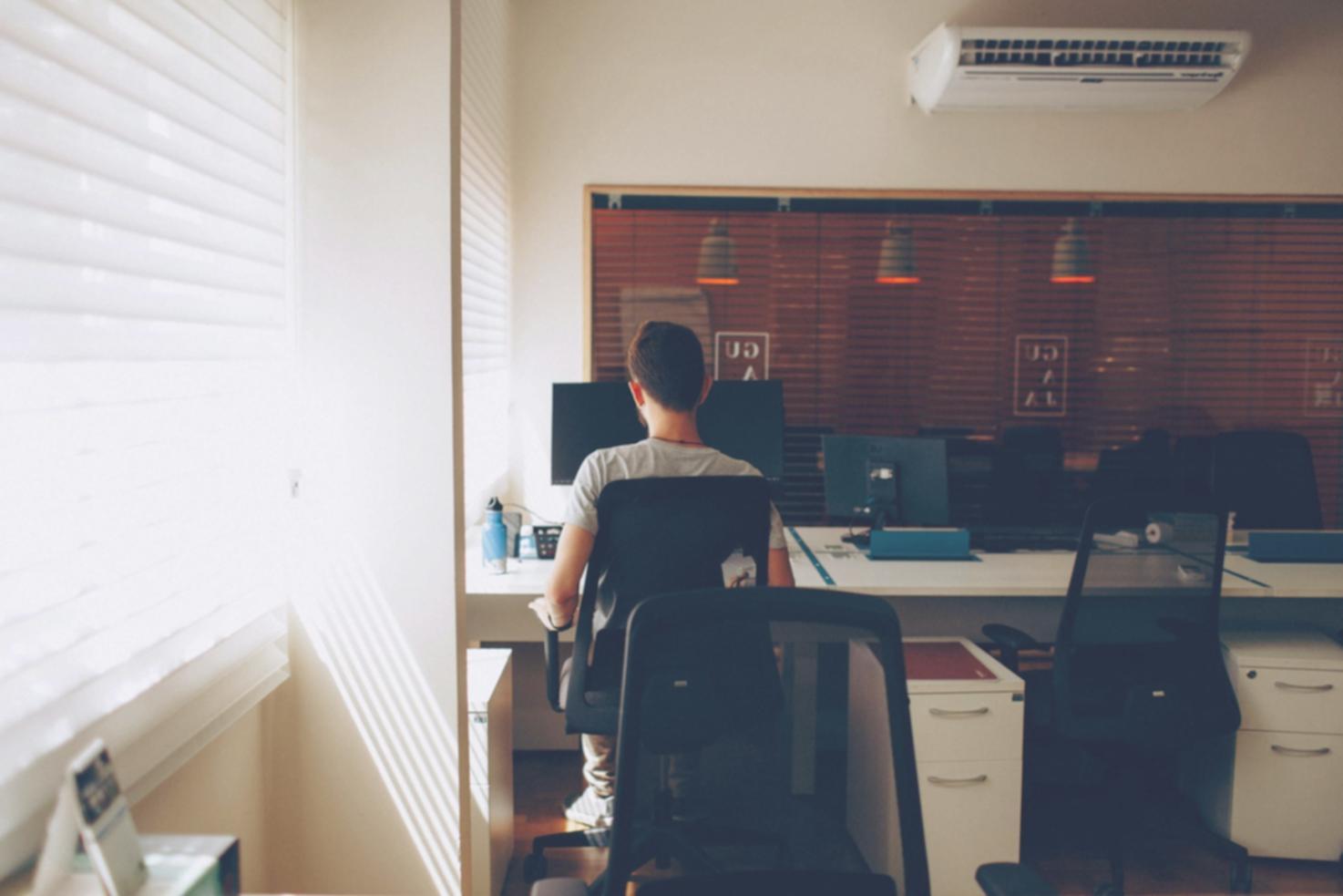 One-on-one mentoring session in modern office setting